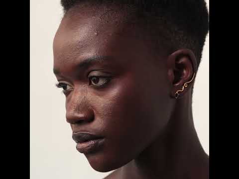 Earrings pins "snakes" with zircon